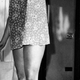 A model from 1966 wears a “short beach dress” made of paper